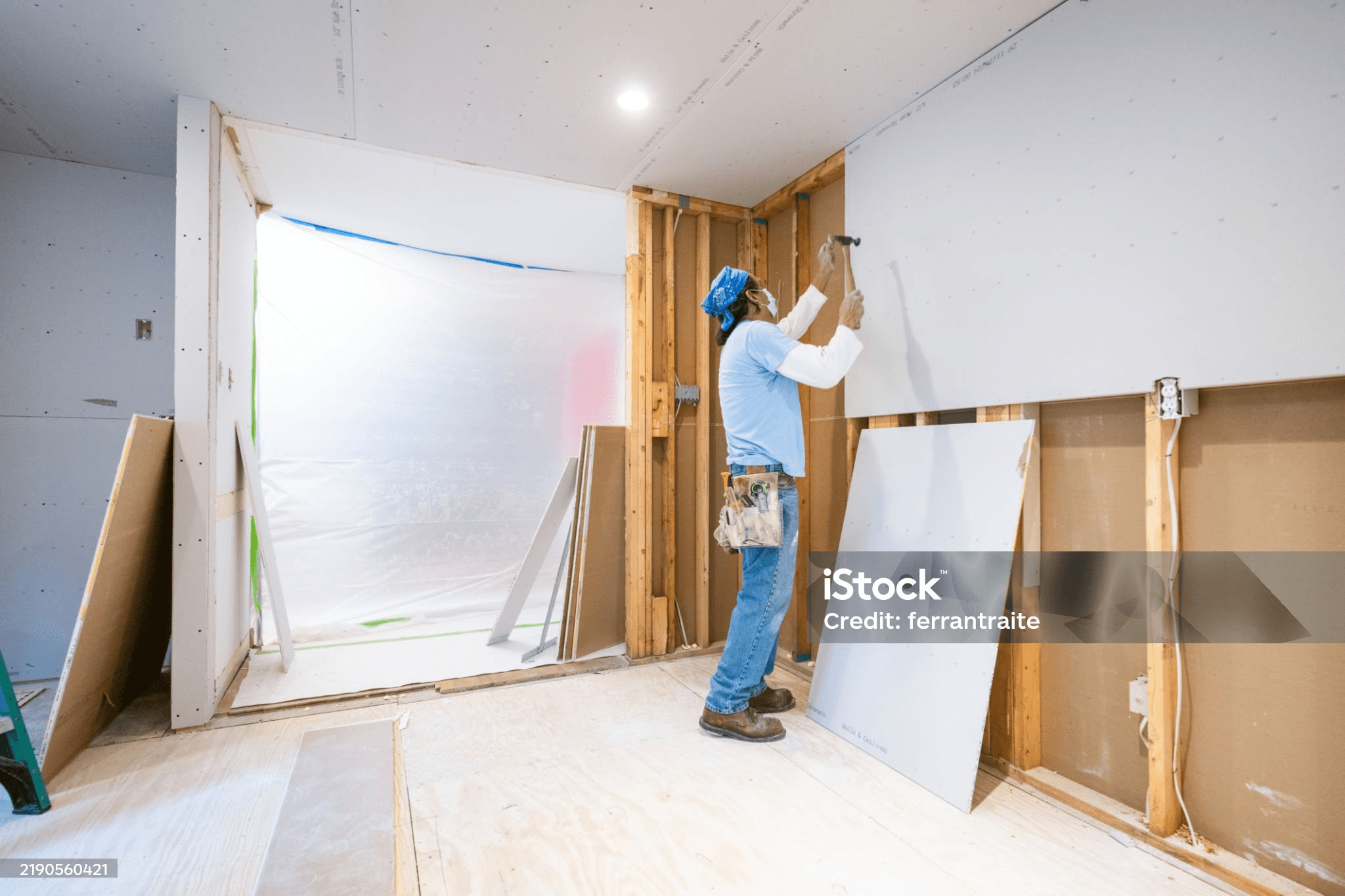 Installing drywall sheets
